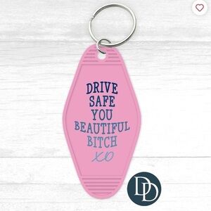 Drive safe pink motel keychain‎